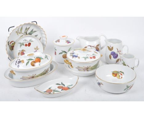 Royal Worcester - 'Evesham' pattern - a circa 1960s part dinner service decorated with varying flowering fruit and vegetable 