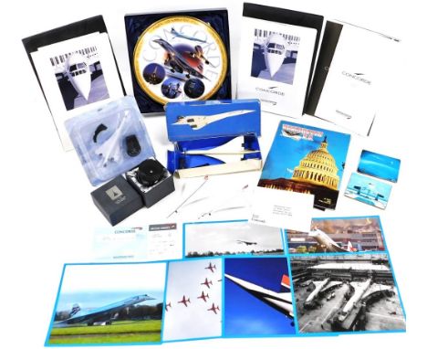Concorde memorabilia, comprising a travel clock model of Concorde on stand, Bradford Exchange limited edition plate stand Roy