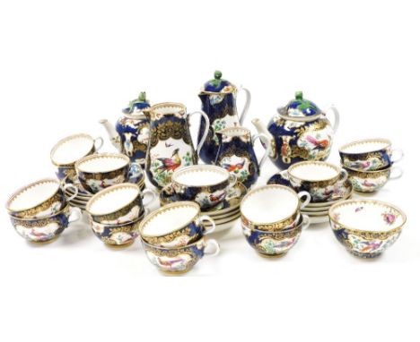 A late 19thC Booths Blue Scale ground tea service, decorated with reserves of exotic birds and flowers, comprising two teapot