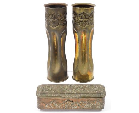 A pair of brass trench art shell case vases, 29cm high, together with a late 19thC Continental copper jewellery casket, embos