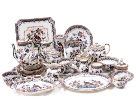 A group of late 19thC Booths pottery decorated in the Old Dutch pattern, comprising a teapot, water jug with pewter hinged li