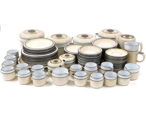 An extensive Denby coffee and dinner service, in brown and cream, to include lidded tureens, dinner plates, side plates, coff