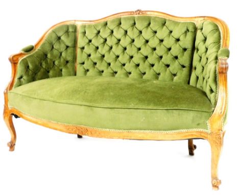 A 19thC Continental walnut show frame sofa, upholstered in green draylon on cabriole legs, 141cm wide.