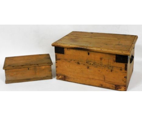 A 19thC pine and metal mount small toolbox, 56cm wide, and another pine box, 37cm wide. 