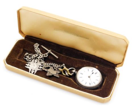 A ladies silver cased pocket watch, open face, key wind, circular enamel dial bearing Roman numerals, the case with foliate e