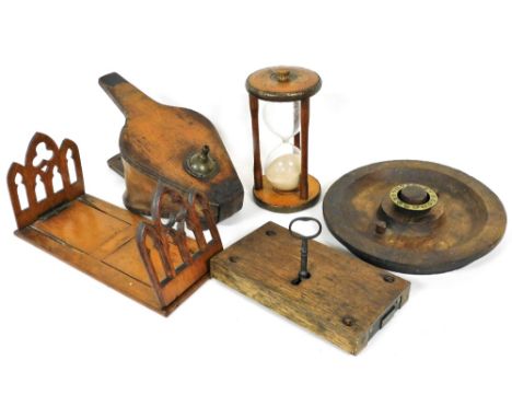 Assorted treen and wooden collectables, including a Victorian Gothic book slide, pair of fire bellows, sand timer, lock plate
