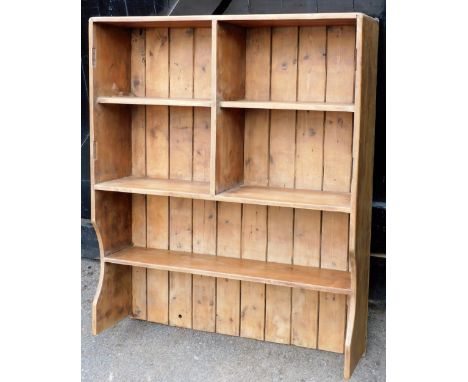 A set of pine open kitchen shelves, with four sections above one long shelf, 106cm high, 84cm wide, 24.5cm deep. 