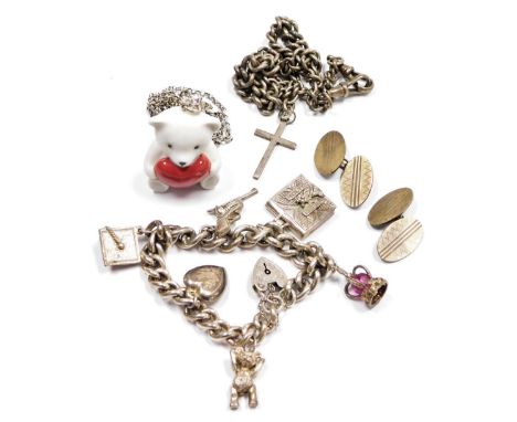 A Lladro porcelain teddy bear and heart pendant on a plated chain, silver curb link charm bracelet, with six charms as fitted