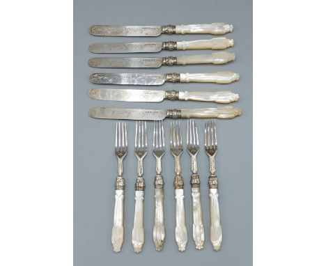 A set of six Victorian silver dessert knives and forks with Mother Of Pearl handles, Sheffield 1860 