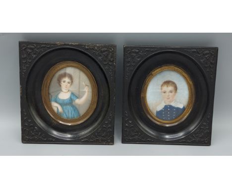 A pair of 19th Century oval portrait miniatures depicting Robert Harcourt and Emilie Harcourt with in ebonised frames, 6.5cms