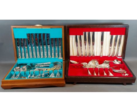 A cased silver plated canteen of cutlery together with another canteen of cutlery 