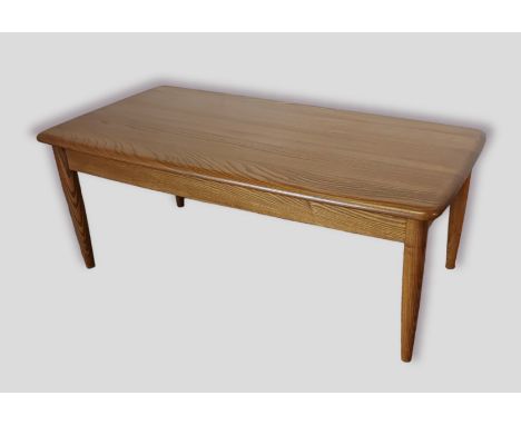 An Ercol coffee table of rectangular form, 102cms x 52cms and 40cms tall 