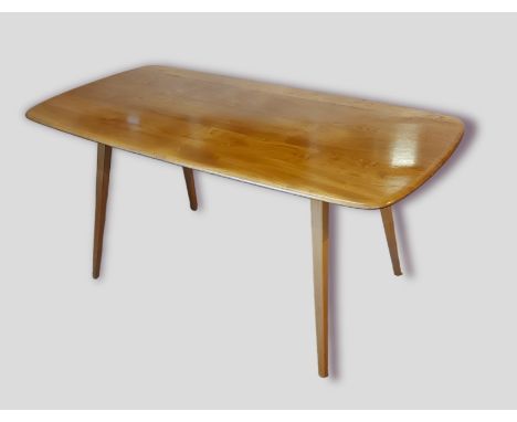 An Ercol blonde ash rectangular dining table, 152cms x 76.5cms 