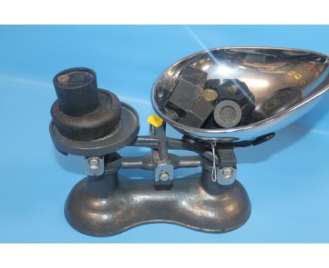 A SET OF VINTAGE CAST SCALES AND VARIOUS WEIGHTS 