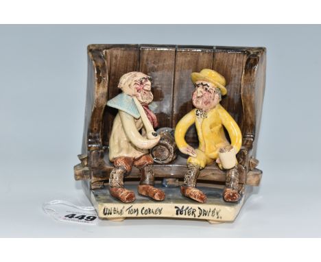 A WILL YOUNG BENCH FIGURE GROUP, depicting the characters Uncle Tom Cobley and Peter Davey seated on a bench with pipe and ba