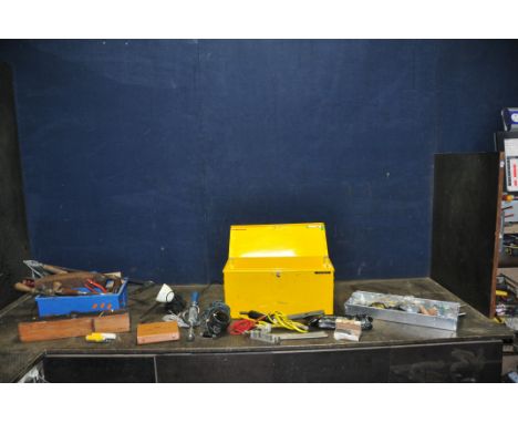 A METAL TOOL BOX AND A TRAY CONTAINING TOOLS including items stamped N E B, a brace, a hand drill, a cased set marked PO BGT 