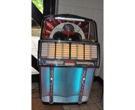 A 1950s WURLITZER MODEL 1800 JUKEBOX IN HORIZON BLUE in working order, plays 45s, width 82cm depth 69cm height 140cm(PAT pass
