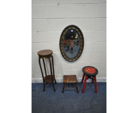 AN OVAL BEVELLED EDGE WALL MIRROR, 80cm x 52cm, a red and black painted stool, a small elm stool and a mahogany plant stand (