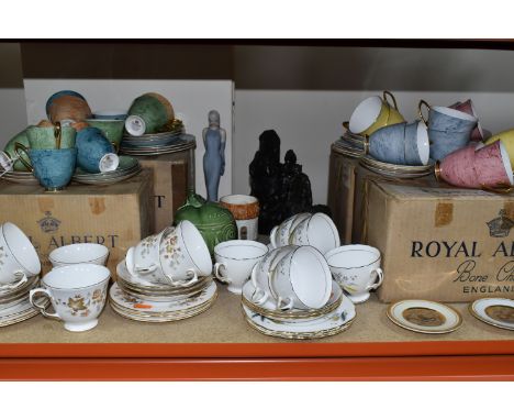 A QUANTITY OF ROYAL ALBERT GOSSAMER KITCHENWARE ETC to include twelve tea cups and accompanying saucers in yellow, pink, ligh