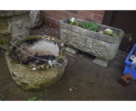 A WEATHERED COMPOSITE CIRCULAR PLANTER, with twin handles, diameter 51cm x height 29cm along with a rectangular composite pla