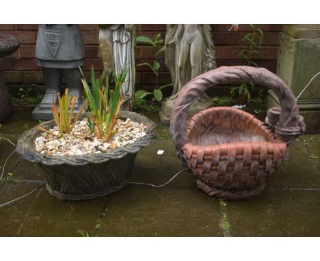 A TERRACOTTA COLOURED COMPOSITE PLANTER, in the shape of a woven basket, along with a weathered oval planter (2)