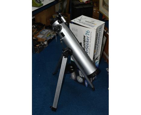 A BOXED CELESTRON POWER SEEKER 76 TELESCOPE, the 76mm reflector telescope with aluminium tripod, F1 = 700mm, F/9, model no 21