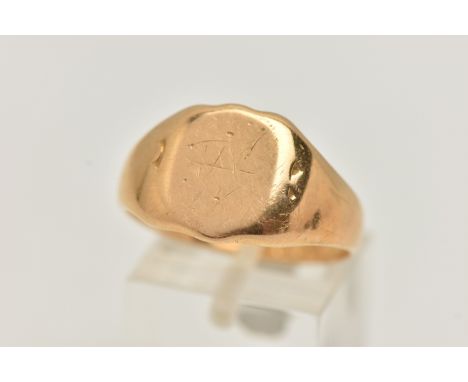 A MID 20TH CENTURY, HEAVY 18CT GOLD GENTS SIGNET RING, worn engraved sheild signet, to a polished band, hallmarked 18ct Birmi