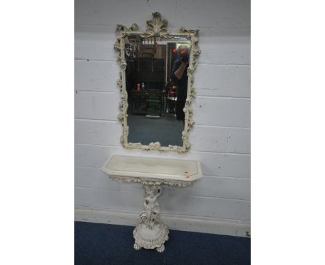 A CREAM RESIN CONSOLE TABLE, with glass insert, floral apron, the top surface been held aloft by a child in robes and flowers