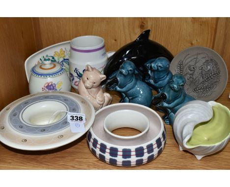 A GROUP OF POOLE POTTERY, to include two Freeform posy vases, a Twin tone seashell in Lime Yellow (green) and Seagull, a Trad