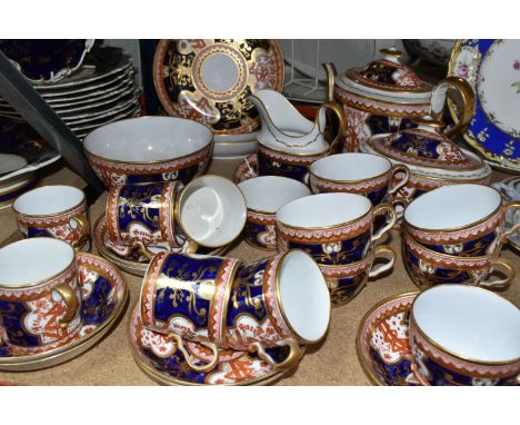 AN EARLY 19TH CENTURY SPODE PORCELAIN DOLLAR PATTERN (No. 715) PART TEA SERVICE, comprising an oval teapot and cover, the ins