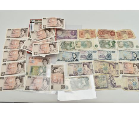 A BISCUIT TIN CONTAINING MAINLY UK BANKNOTES, to include an 1888 Crown coin, an 1806 George III Penny, 14x page high grade cr
