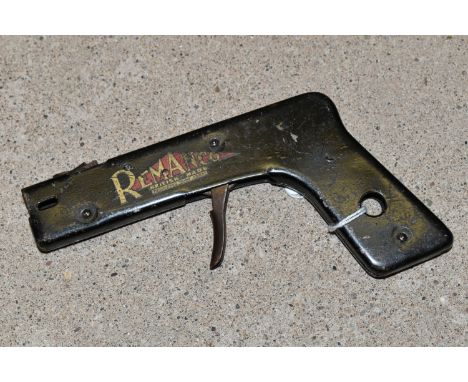 A VINTAGE REMANCO SPARK LIGHTER OF GUN FORM, in used condition