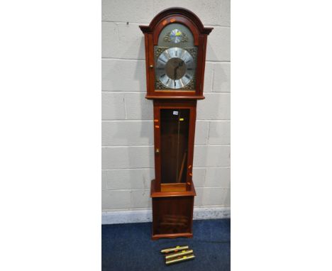 A LATE 20TH CENTURY TEMPUS FUGIT LONGCASE CLOCK, the arched hood enclosing a 9.5 inch brass and silvered dial, three weights 