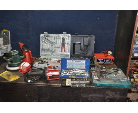 A COLLECTION OF AUTOMOTIVE TOOLS including bearing pullers and installers, partial socket sets, spanners, vintage oil funnels