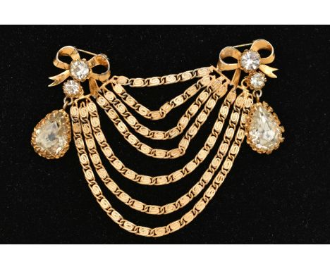 A 1950'S CHRISTIAN DIOR BY MITCHEL MAER DOUBLE BROOCH, the bow and swag design with colourless paste detail and brooch fittin