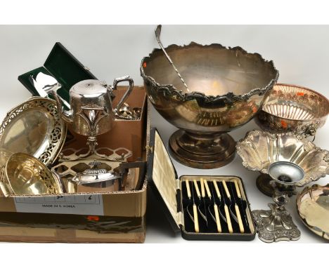 A BOX OF WHITE METAL WARE, to include a large silver plate punch bowl with ladle, a smaller punch bowl, trays, teapots, baske