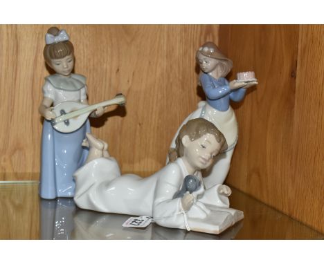 THREE NAO FIGURES, comprising Repeat After Me no 1285, Puppy's Birthday no 1045 and Girl With Mandolin no 1033 (3) (Condition