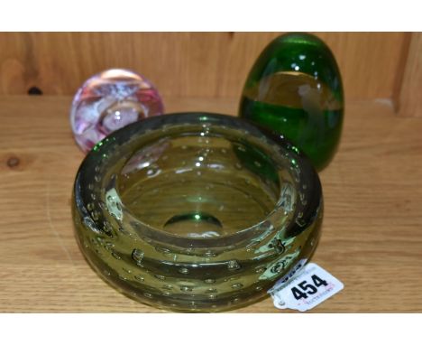 A WHITEFRIARS BOWL AND TWO CAITHNESS PAPERWEIGHTS, the green Whitefriars bowl with controlled bubbles, diameter 12.5cm x heig