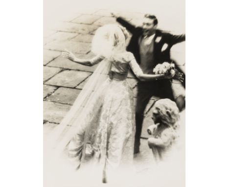 δ Norman Parkinson (1913-1990)The Wedding Embrace; Wedding Couple with BridesmaidsTwo unique gelatin silver prints, 1950s, on