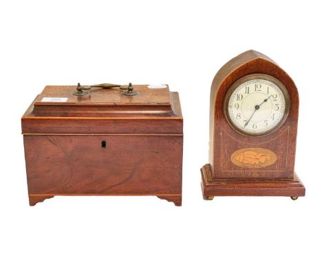 An Edwardian mahogany inlaid timepiece; together with a Georgian mahogany tea caddy (2)Condition report: The clock is not wor