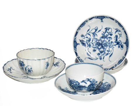 Two Worcester tea bowls and saucers painted in underglaze blue with Gillflower and Fence pattern, together with two other Wor