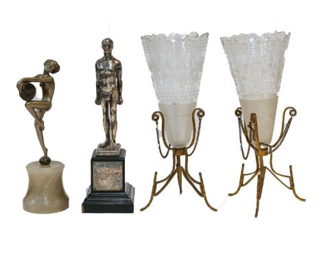 An Art Deco silvered spelter figure of a dancing girl after Lorenzl, raised on an onyx plinth (a.f); together with a silvered