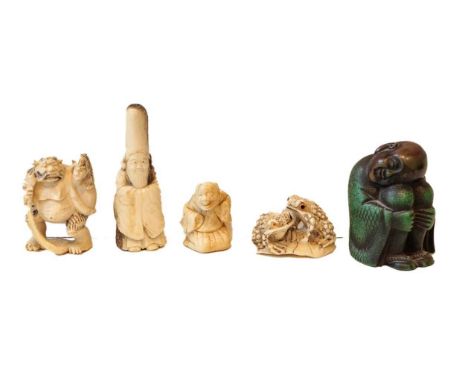 Five Japanese Meiji period netsukes, one carved from antler formed as a sage, three ivory examples including a pair of toads,