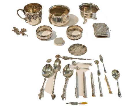 A selection of silver and plated items consisting of: a silver vesta case, silver trowel form bookmarker, silver napkin rings