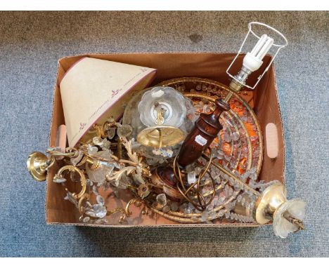 A gilt metal and lustre drop four-tier chandelier, two other chandeliers, and a turned oak table lamp (one box)