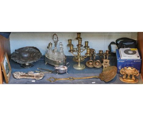 A quantity of silver plated items including a six-bottle cruet set, together with various brass items (one shelf), together w