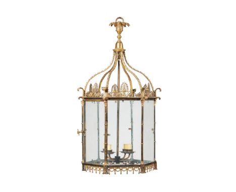 A REGENCY STYLE PATINATED AND GILT BRASS HEXAGONAL LANTERNLATE 20TH CENTURY Each panel separated by cluster columns with anth