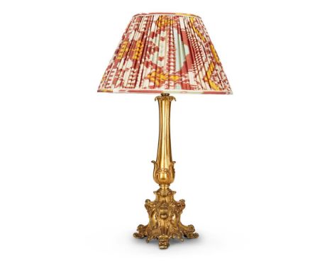 A FRENCH GILT METAL 'ROCOCO REVIVAL' TABLE LAMP With a Robert Kime ikat shade77cm high including shade, 57cm high excluding e