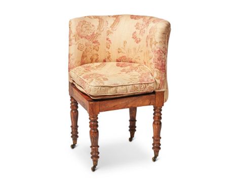 A GEORGE IV SIMULATED ROSEWOOD CORNER COMMODE CHAIRCIRCA 1825With a tub shaped back and turned legs73cm high, 58cm wide, 59cm