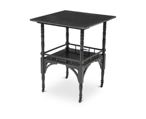 AN AESTHETIC MOVEMENT EBONISED OCCASIONAL TABLELATE 19TH CENTURYWith square top above a galleried undertier, on turned legs66